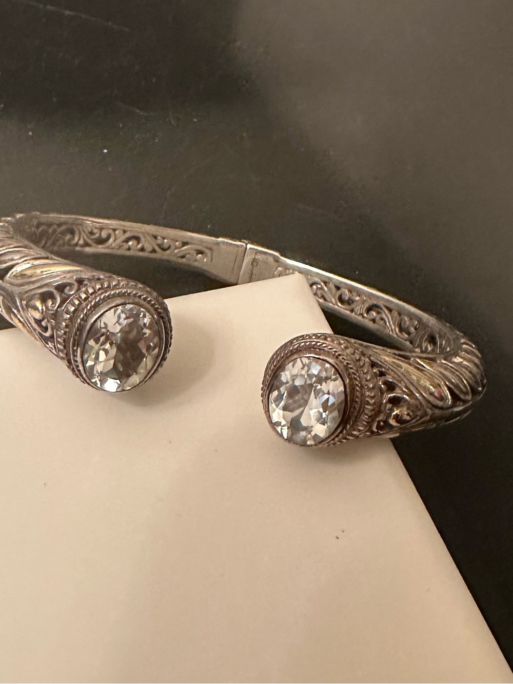 Robert Manse Sterling Silver, 18 k gold and white topez hinged bracelet.